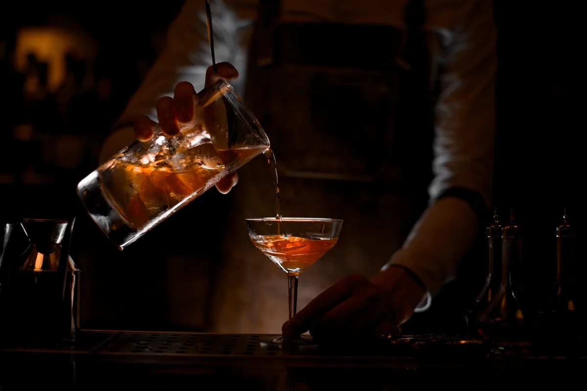 A hospitality team preparing drinks during service